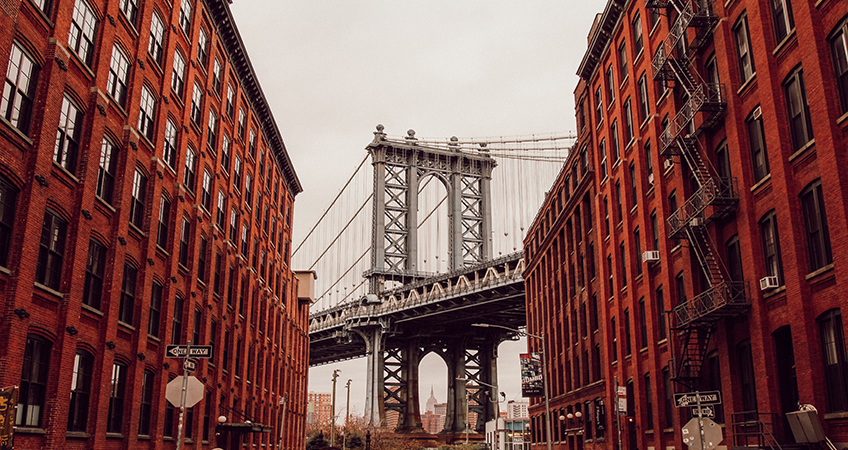 Olympia Dumbo near the Brooklyn Bridge in New York has topped out at 26 stories.  Photo by Miltiadis Fragkidis on Unsplash