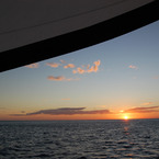 Pelican_eyes_sunset_sailboat_b_1