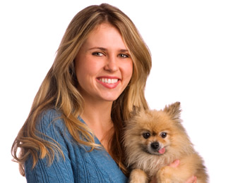 Mikkel Becker holding her dog Teddy