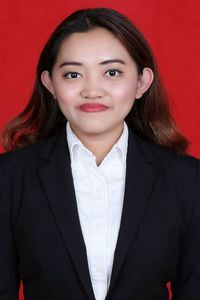 drg. Bella Fernanda, M.K.G., M.I.Kom.