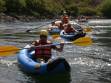 Boats_in_calm_with_kayaks