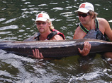 Eli_and_chris_with_sturgeon_and_hcr_hats