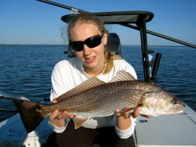 Georgia with a nice Mosquito Lagoon Redfish. <br><br><br><br>Call Captain Mike Bales at 352-255-8175 to book your Mosquito Lagoon fishing charter! <br>Or, visit us on the web at http://www.hotfishcharters.com or on Facebook Hotfish Charters Mosquito Lagoon FIshing-Guide