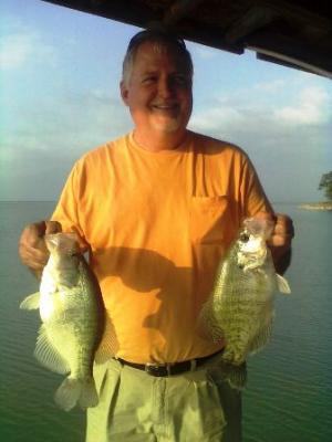 The gentleman in the picture is a Texarkana High School buddy of mine that fished with me on Friday of last week! He and three other friends caught a boat load of White Bass and even a few Crappie!<br> <br>