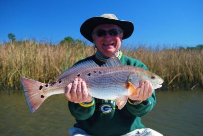 Robinson Brothers Guide Service <br>877-6-REDFISH <br>www.floridaredfish.com 