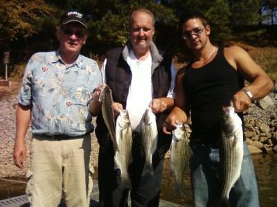FIRST BITE GUIDE SERVICE.<br>www.firstbiteguideservice.com<br>Striped and Hybrid Bass.<br>770 827-6282<br>