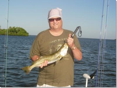 Capt. Butch Rickey/BarHopp'R Guide Service<br>Phone#: - 239-633-5851 <br>Email: - capt@barhoppr.com <br>www.barhoppr.com <br><br><br>Blain shows off a beautiful trout!<br><br>