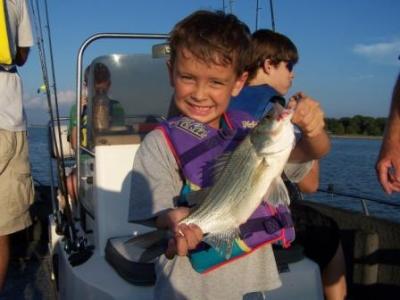 Ethan and fish. Gone Fishin' Guide Service