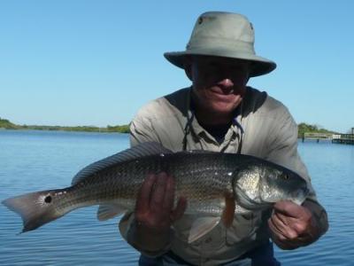 Larry with a nice tailer.<br><br><br>Call Captain Mike Bales at 352-255-8175 to book your Mosquito Lagoon fishing charter! <br>Or, visit us on the web at http://www.hotfishcharters.com or on Facebook Hotfish Charters Mosquito Lagoon FIshing-Guide