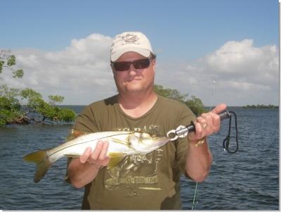 Capt. Butch Rickey/BarHopp'R Guide Service<br>Phone#: - 239-633-5851 <br>Email: - capt@barhoppr.com <br>www.barhoppr.com <br><br><br>Blain with the first snook!<br>
