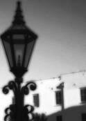 Lamppost_against_a_sunny_building