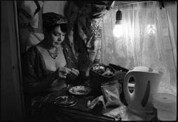 Acrobat_woman_sewing
