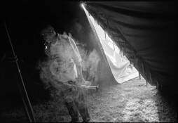 Trumpet_player_smoking_in_tent