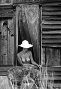 Women_in_cabin_window