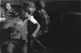 Boy_with_bicycle_rim