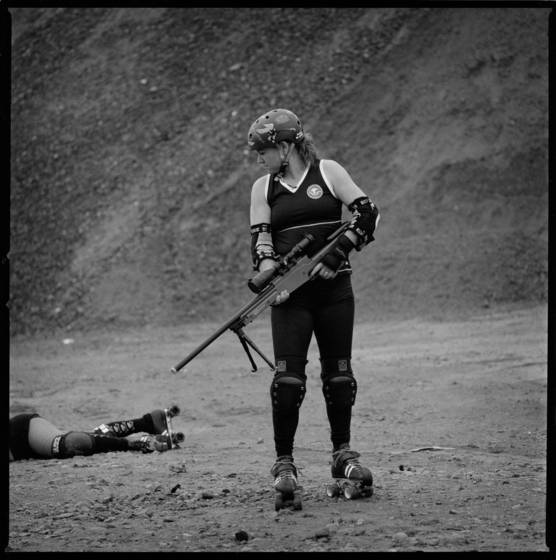 Dc_roller_girl_gun_her_down