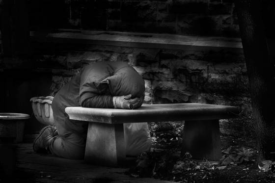 Man_in_church_courtyard