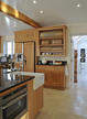 bespoke oak kitchen with travertine floor