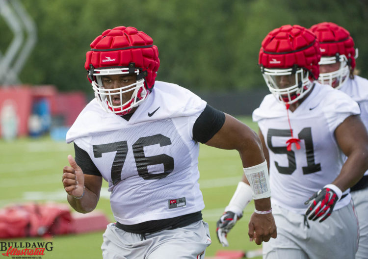 Freshman Michail Carter followed by freshman David Marshall
