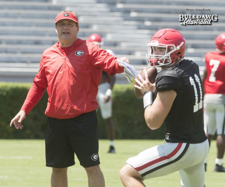 Kirby Smart looks on as his freshman QB Jake Fromm (11) goes through drills during UGA's second scrimmage of Fall Camp - Saturday, August 19, 2017 -