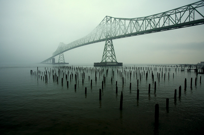 Fog draped over the Astoria-Megler Bridge in Astoria, Oregon. Large