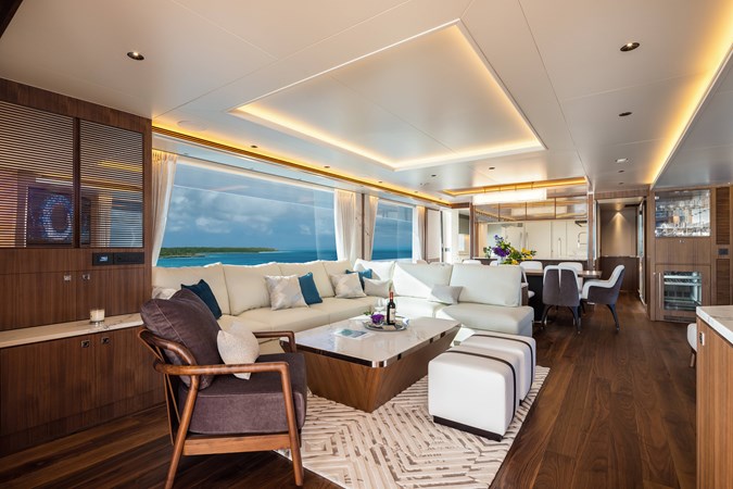 Horizon FD100 sisterhip main salon with dark wood flooring.