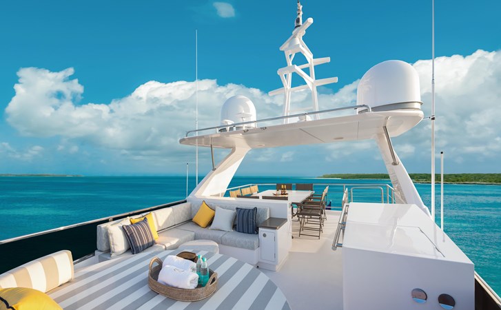 Horizon FD100 sistership tri-deck with sunpads and seating.