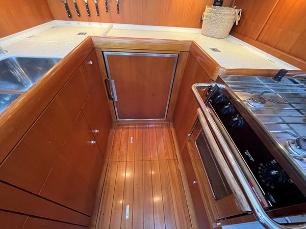 Galley, refrigerator and stove, freezer toploading