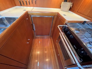 Galley, refrigerator and stove, freezer toploading