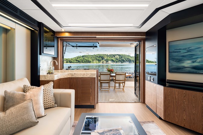 Horizon V68-Hull 12 open salon leading out to aft deck.