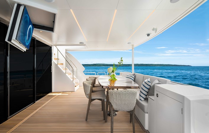 Horizon FD80 Hull 17 aft deck with TV and seating.