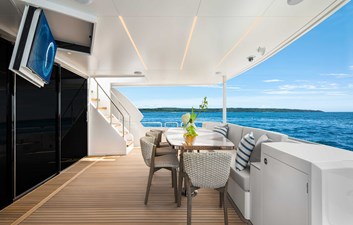 Horizon FD80 Hull 17 aft deck with TV and seating.
