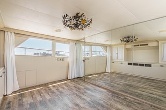 Spacious Dining Area with Mirror Walls