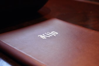 A guestbook with the notes of many illustrious guests