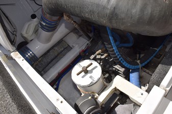 Port side motor aft, Racor filter, fiberglass surge tubes