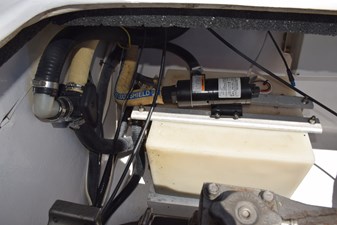 Holding tank outboard of starboard motor