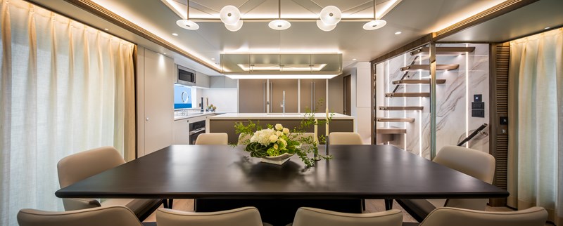 Horizon FD90 Hull 34 with luxury lighting feature in dining area.