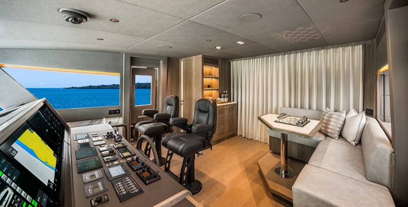 Horizon FD90 Hull 34 Split-use Skylounge with helm, dayhead and sofa.
