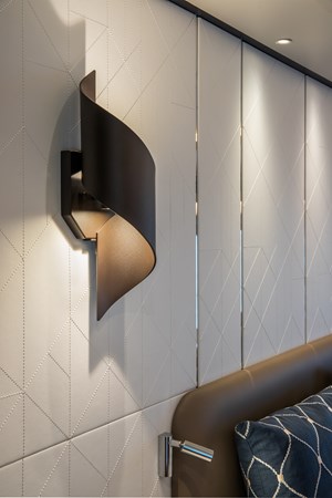 Horizon FD90 Hull 34 with custom stitched headboard and sconces.