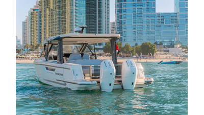 Saxdor 400 GTO ICE viewed from the stern, highlighting twin Mercury V10 400 engines and sleek transom design.
