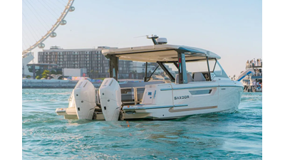 Saxdor 400 GTO ICE viewed from the stern, highlighting twin Mercury V10 400 engines and sleek transom design.