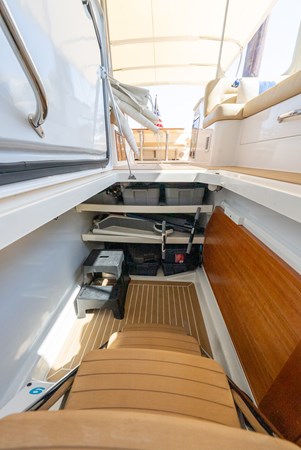 Midships Upper Salon Storage Compartment with Large Dining Table