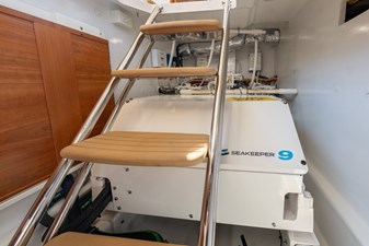Midships Upper Salon Storage Compartment with Seakeeper