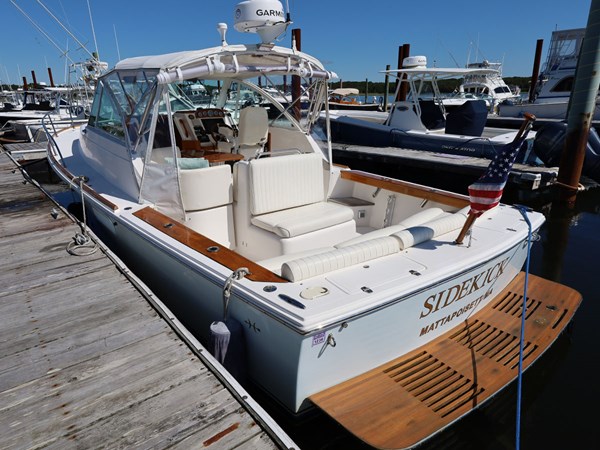 SIDEKICK, 2007 Hunt Yachts Surfhunter 29: Port Quarter at The Dock