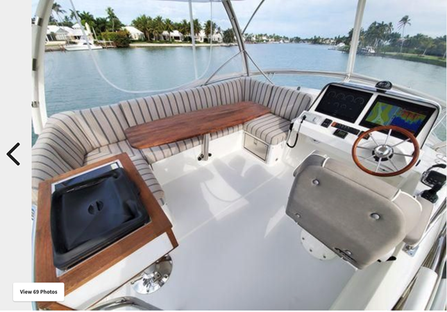 DEFY GRAVITY, 2018 Sabre 48 Flybridge Sedan, Flybridge Grill and Table