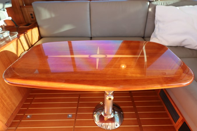 DEFY GRAVITY, 2018 Sabre 48 Flybridge Sedan, Salon Table Closeup