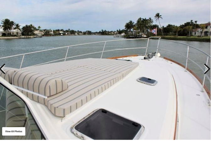 DEFY GRAVITY, 2018 Sabre 48 Flybridge Sedan, Sunpad on Foredeck