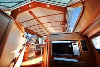 DEFY GRAVITY, 2018 Sabre 48 Flybridge Sedan, Salon Overhead from Galley