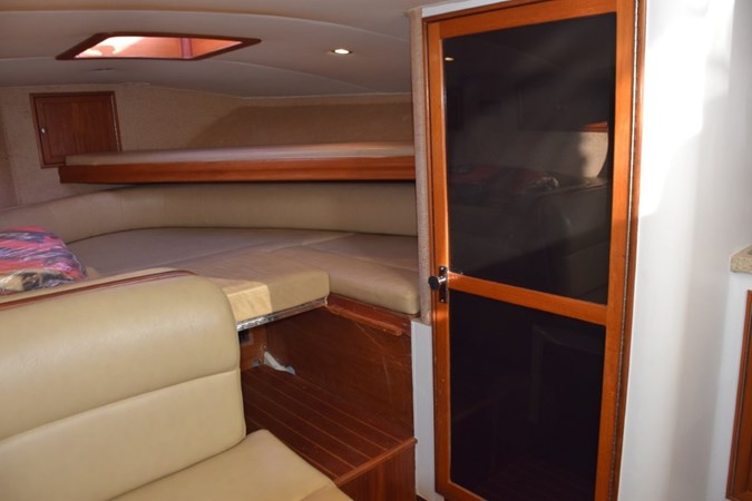 Portside door to head compartment. Forward quarter berth and overhead hatch