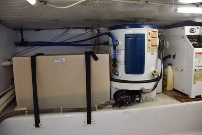 Holding tank, hot water heater, bait well pump